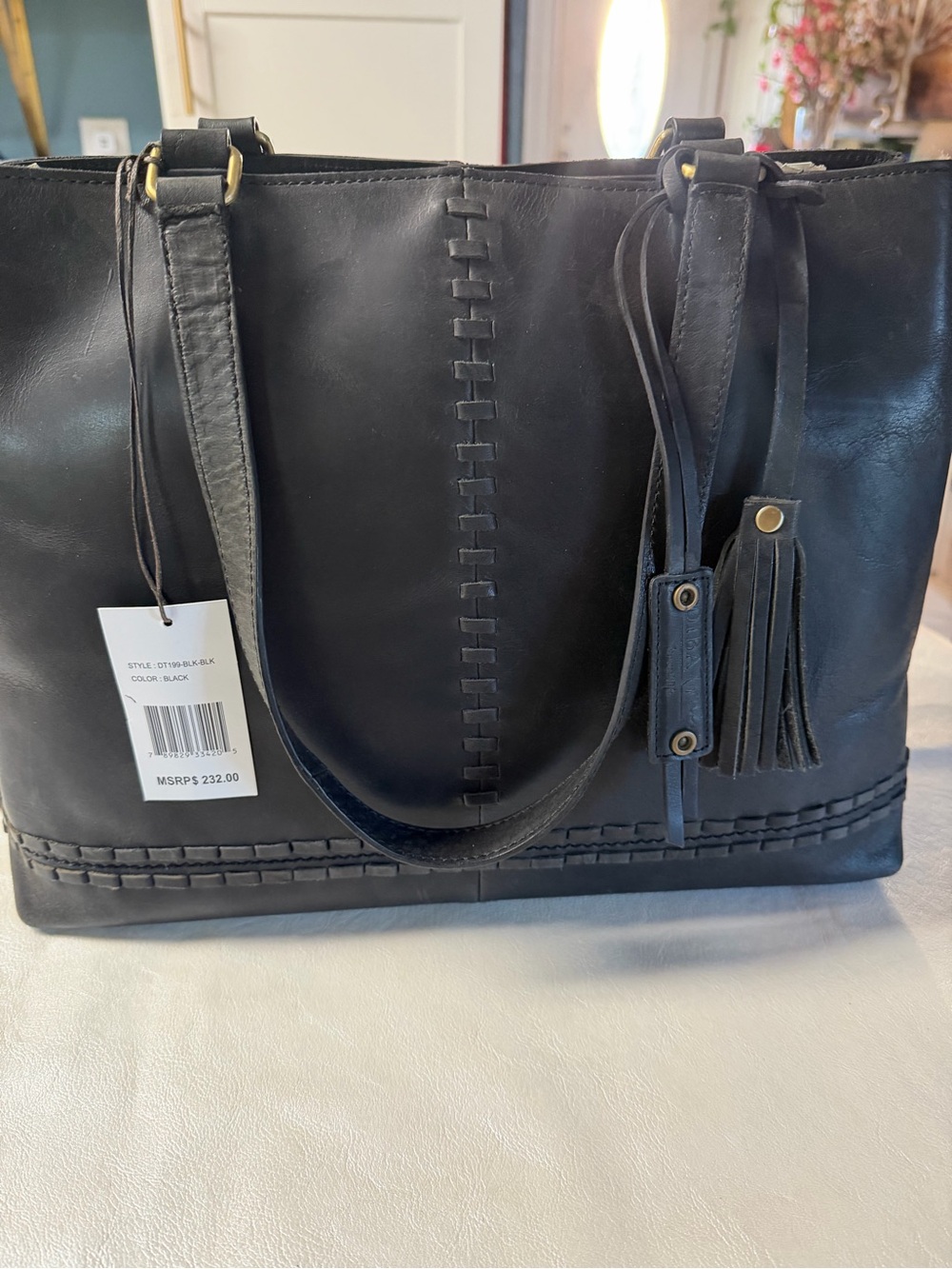 Diba True Black  Leather Shoulder Tote with Woven Stitch Detail and Tassel